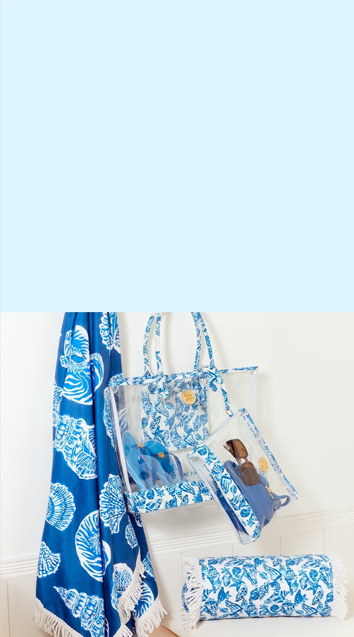 blue and white shell printed pillow, blanket, and tote