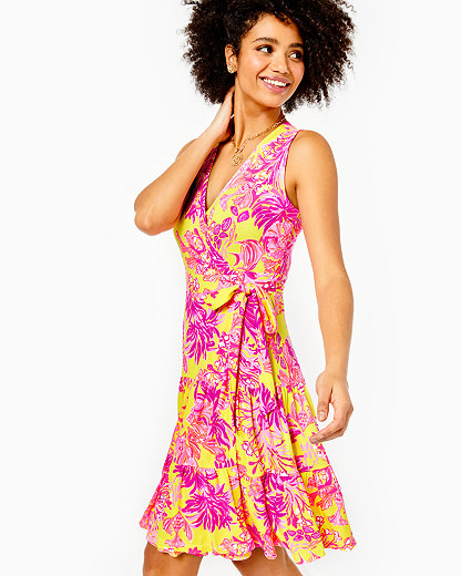 FIT AND FLARE WRAP DRESS WITH SURPLICE NECKLINE AND TIERED SKIRT. 37" FROM TOP OF SHOULDER TO HEM BA WOMEN'S FOLLY WRAP DRESS IN YELLOW SIZE MEDIUM, FLORAL CORAL - LILLY PULITZER IN YELLOW