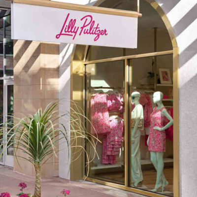 home office with lilly prints on the wall