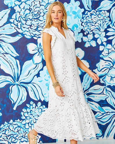 model wearing long white dress