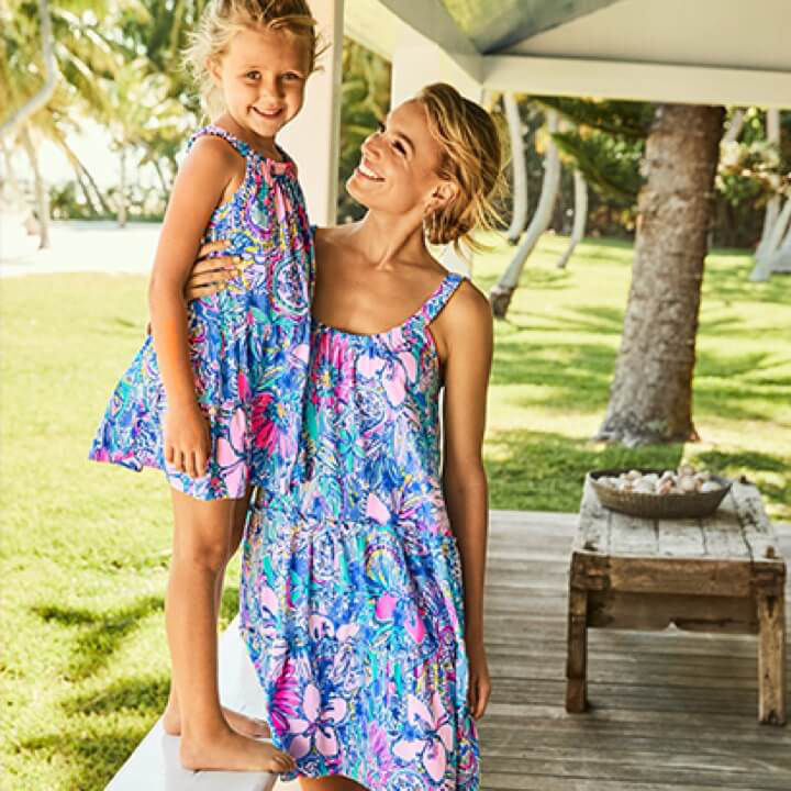 woman and child wearing matching dresses in the got your back print