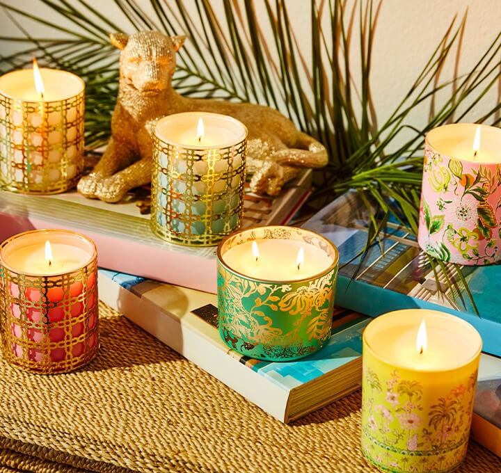 colorful glass candles with gold decoration