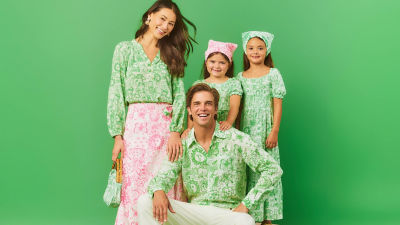 models wearing green and pink dresses