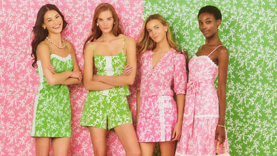 model wearing a green and pink robe