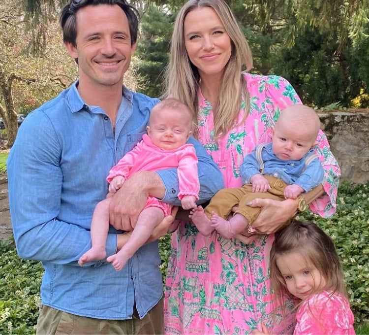 Thea Gallagher smiling with her family