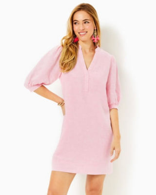 model wearing solid pink linen dress