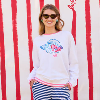 model in white sweater