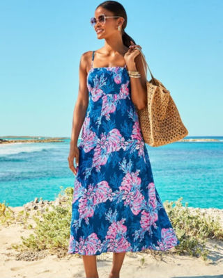 model wearing blue white and pink midi dress