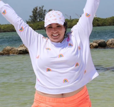 Angela Rivers smiling with her family