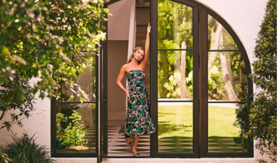 woman wearing green printed dress