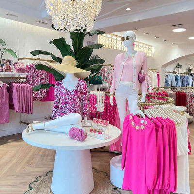 home office with lilly prints on the wall