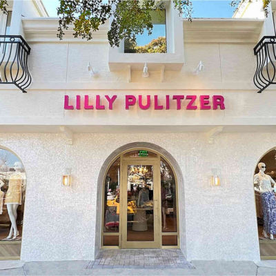 home office with lilly prints on the wall