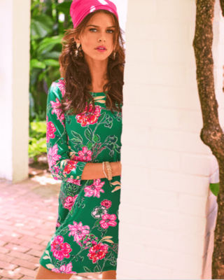 model wearing a green floral dress