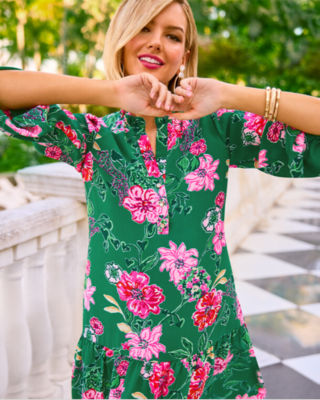 model wearing a green floral dress