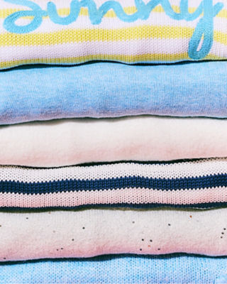 stacked colored sweaters