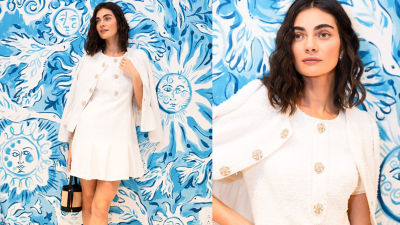 models wearing printed dres with feathers