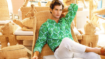 Man wearing a white shirt and green printed pants