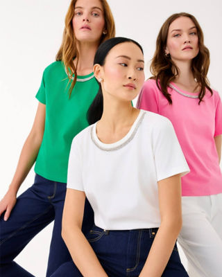 Women wearing embellished tops