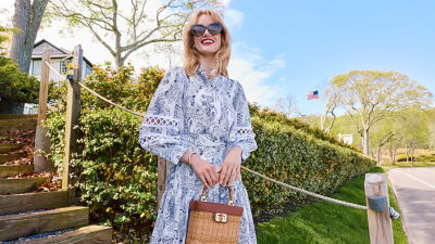 Woman wearing a blue and white printed dress