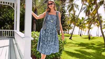 Woman wearing a blue printed dress