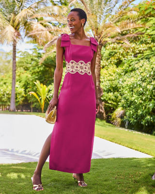 Woman wearing a dark pink long dress