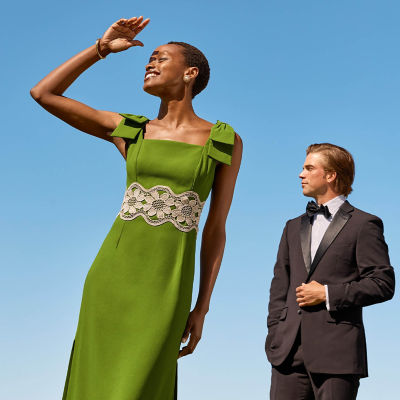 Women wearing a long green dress