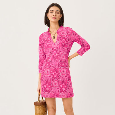 Woman wearing a printed pink dress