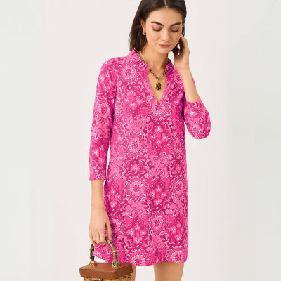 Woman wearing a printed pink dress