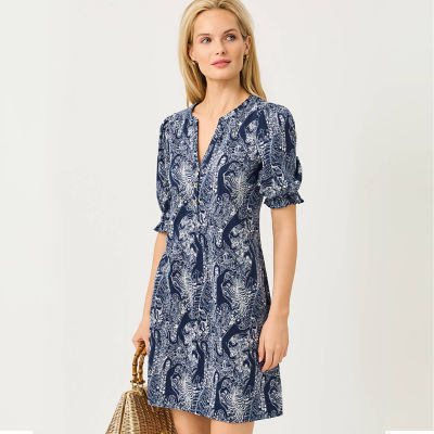 Woman wearing a blue printed dress