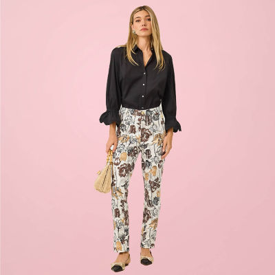 Woman wearing brown printed pants