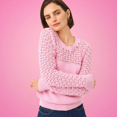Woman wearing pink sweater