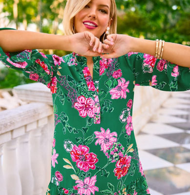 Woman wearing a green floral printed dress