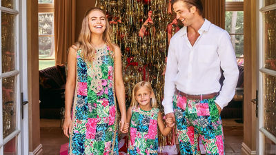 Family wearing matching blue printed outfits