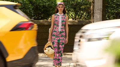 Woman wearing a pink printed top and pants