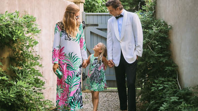 Family wearing coordinating outfits