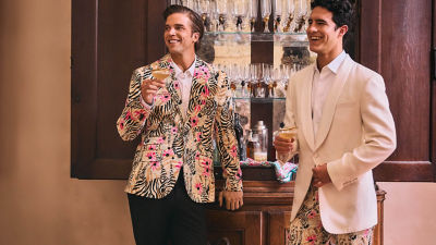 Two men wearing blazers