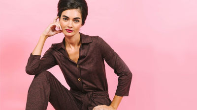 Woman wearing a brown lounge jumpsuit