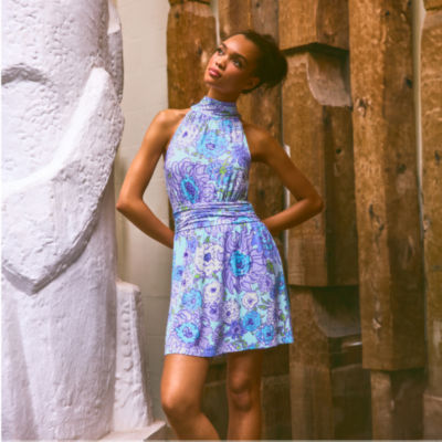 Woman wearing a blue printed romper