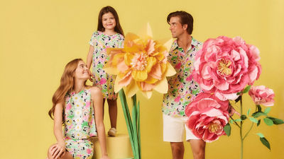 Family wearing matching Disney printed outfits