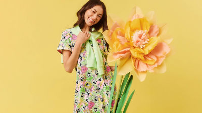 Woman wearing a printed Disney dress