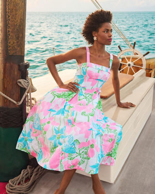 Woman wearing a pink printed dress