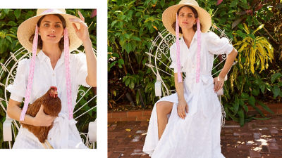 Woman wearing a white maxi dress and a straw hat