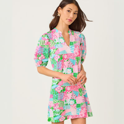 Women wearing a pink patch print dress