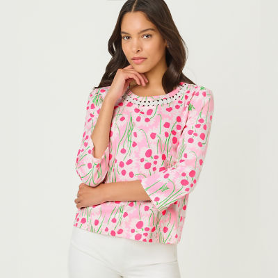 Women wearing a pink printed top