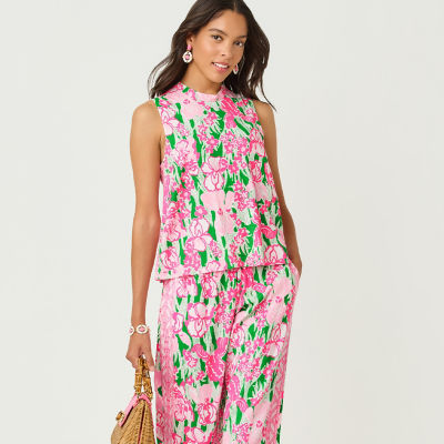 Women wearing a pink printed top and bottoms