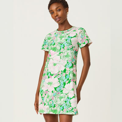 Women wearing a green printed dress