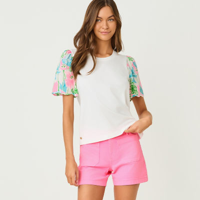 Women wearing a white top and pink shorts