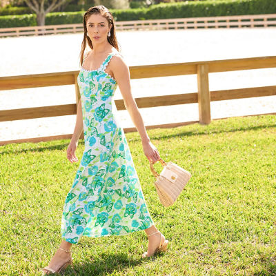 Women wearing a blue and green printed maxi dress
