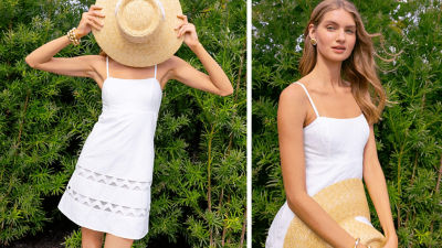 Woman wearing a white short dress and holding a straw hat