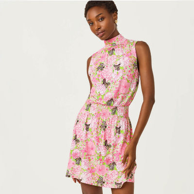 Women wearing a pink printed dress